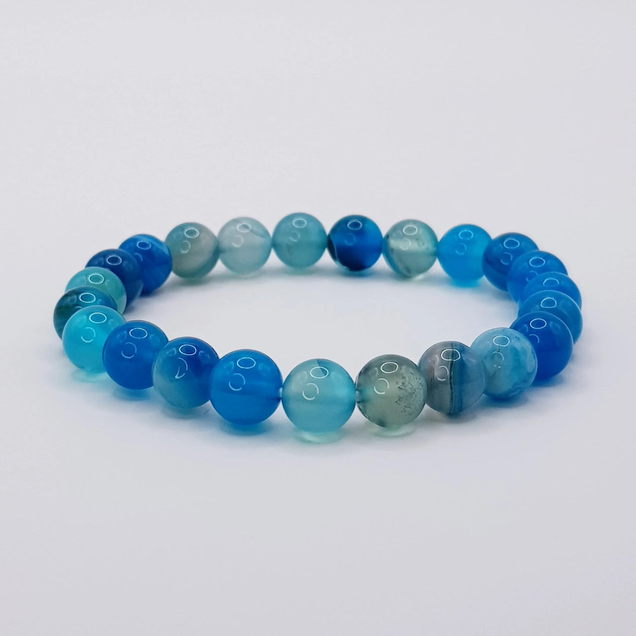 Blauer Onyx-Perlenarmband – One-Size, Dehnbar, Handgefertigt - World of Crystals
