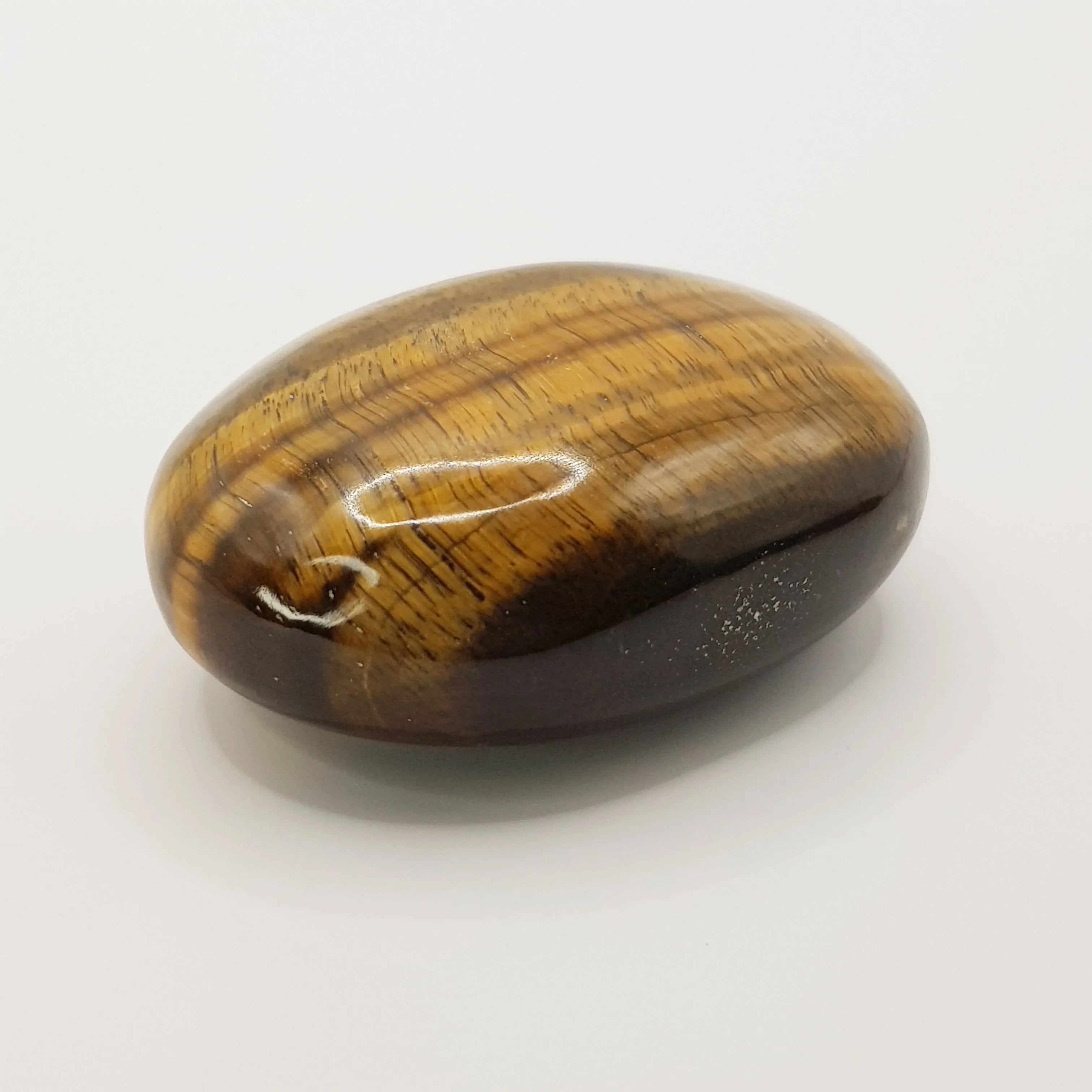 Gelbes Tigerauge-Palmstein – 5cm, Handgefertigt - World of Crystals